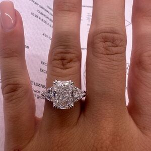 4.01 carat E VS1 elongated cushion with trillion side diamonds engagement ring